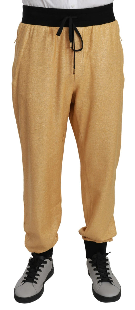 Dolce & Gabbana Elegant Gold Motif Sweatpants - The Home of Luxury